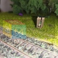 Kerti pottyantós WC fekete (bitumenes) tetővel, ülő figurával - H0